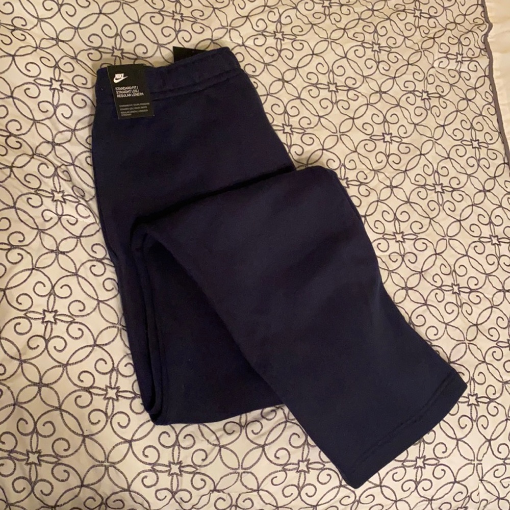 Nike standard fit navy blue sweatpants.